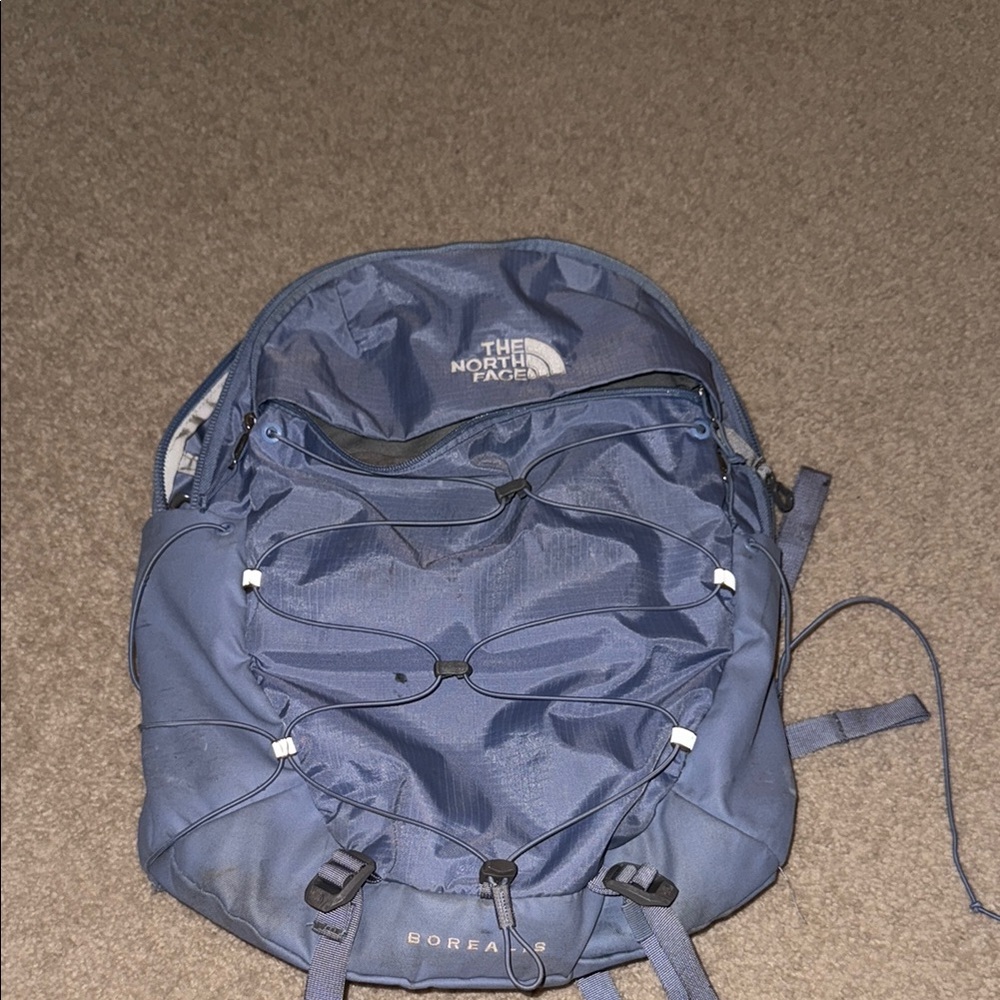 The North Face Blue Backpack with Adjustable Straps